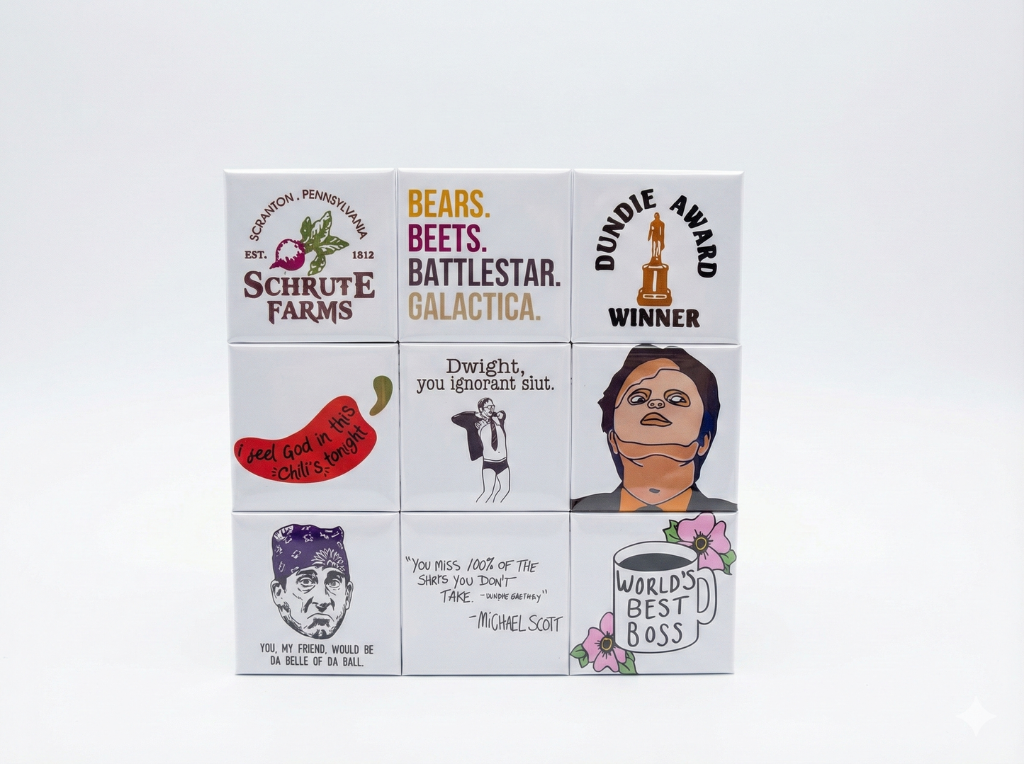 Close up of Schrute Farms and Prison Mike funny magnets.